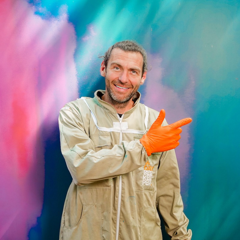 Laurence Edwards wearing orange gloves